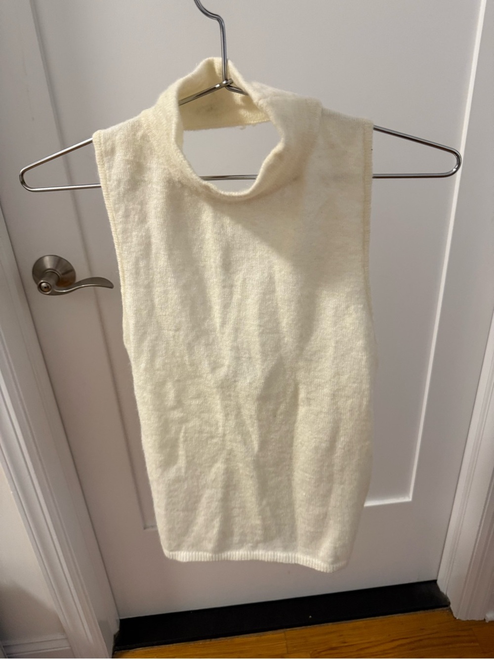 Cream Sleeveless Turtleneck Knit Top
